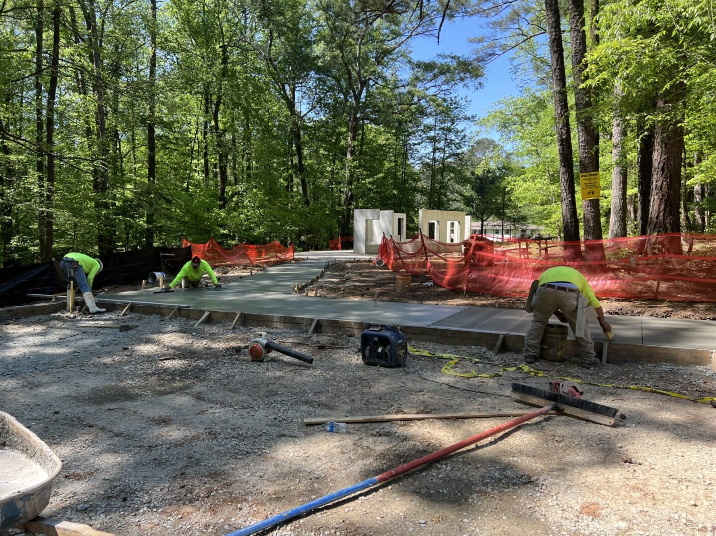 A group of people working on the ground.